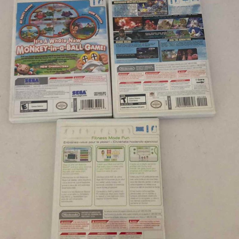 Photo 1 of 3-NINTENDO WII GAMES: SUPER SMASH BROTHERS BRAWL, SUPER MONKEY BALL BANANA BLITZ AND WII FIT