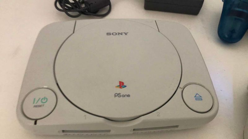 Photo 1 of SONY PLAYSTATION PS ONE GAME SYSTEM AND 2-CONTROLLERS