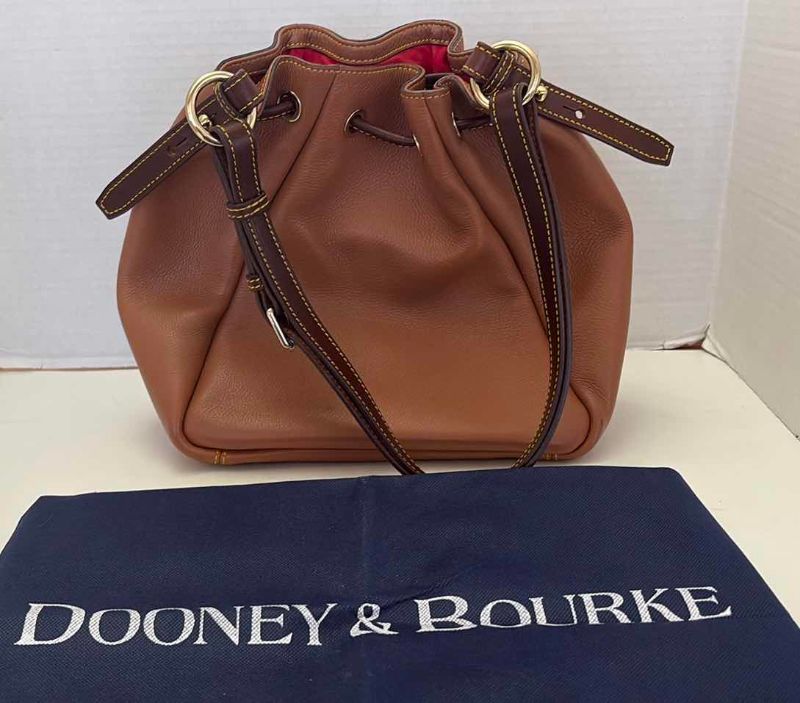 Photo 1 of DOONEY AND BOURKE BROWN LEATHER TASSEL SHOULDER BAG PURSE WITH DUSTCOVER