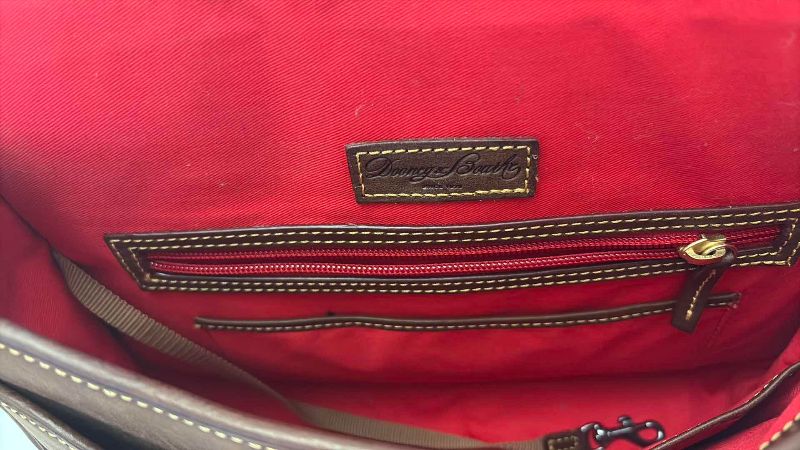 Photo 1 of DOONEY AND BOURKE LEATHER FLORENTINE SADDLE BAG WITH DUSTCOVER