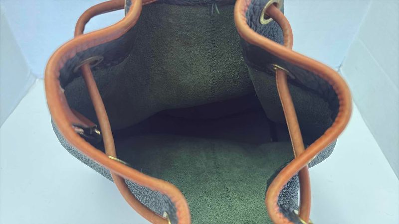 Photo 1 of VINTAGE DOONEY AND BOURKE IVY GREEN DRAWSTRING BAG WITH DUSTCOVER