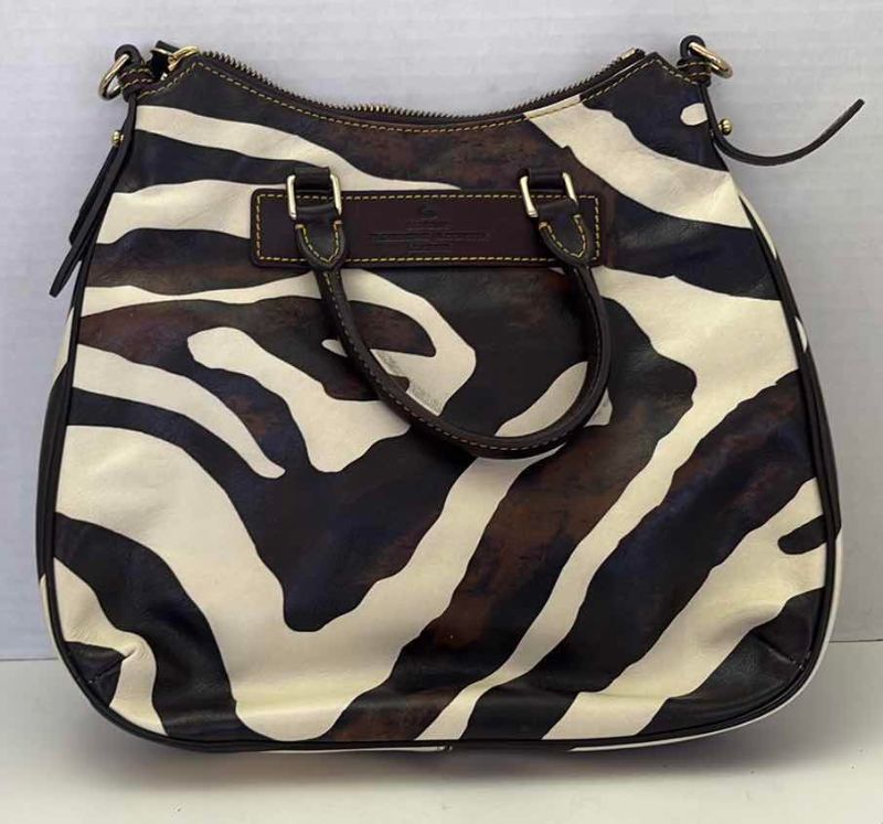 Photo 1 of DOONEY AND BOURKE ZEBRA PRINT SHOULDER BAG WITH DUSTCOVER