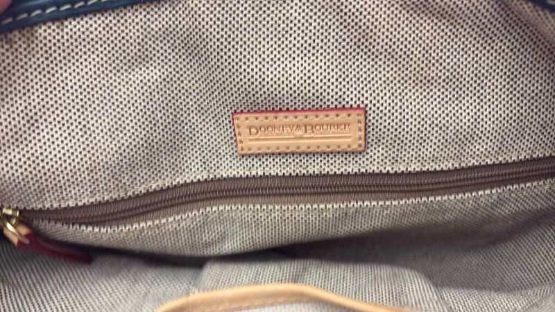 Photo 1 of DOONEY AND BOURKE LEATHER GREEN SHOULDER BAG WITH DUST COVER AND KEY CHAIN