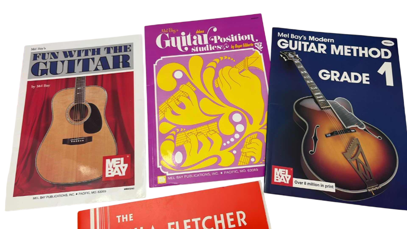 Photo 1 of GUITAR AND PIANO INSTRUCTIONAL MUSIC BOOKS