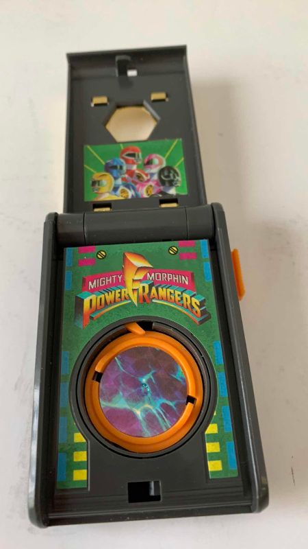 Photo 1 of MIGHTY MORPHIN POWER RANGERS SPIN FIGHTERS LAUNCHER AND TOPS