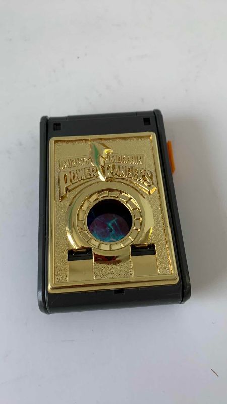 Photo 1 of MIGHTY MORPHIN POWER RANGERS SPIN FIGHTERS LAUNCHER AND TOPS