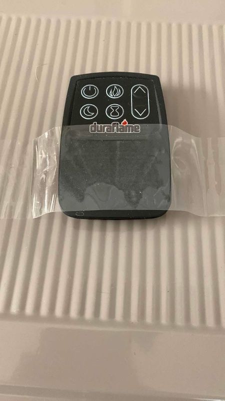 Photo 1 of DURAFLAME ELECTRIC FIREPLACE STYLE HEATER 24” X 12” H 24”