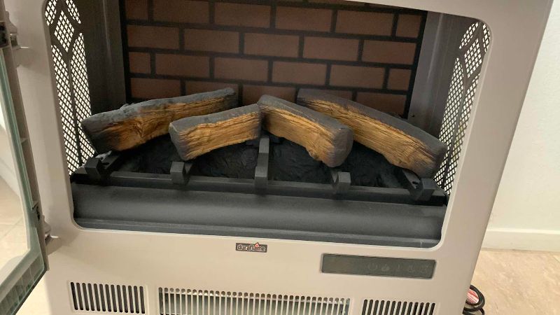 Photo 1 of DURAFLAME ELECTRIC FIREPLACE STYLE HEATER 24” X 12” H 24”