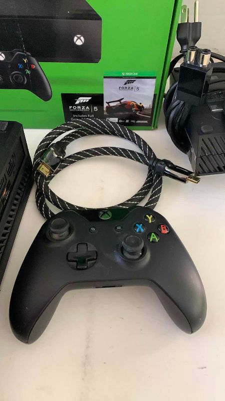 Photo 1 of XBOX ONE GAME SYSTEM  MODEL 1540 WITH A KINECT  AND A CONTROLLER