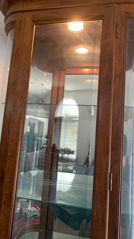 Photo 1 of VINTAGE CURVED GLASS CURIO CABINET 27” X 13” H 76
