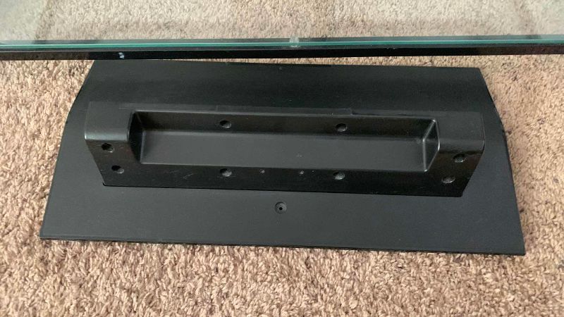 Photo 1 of VIZIO VO420E TELEVISION AND GLASS AND METAL ROTATING TELEVISION STAND 44” X 21” H 61”