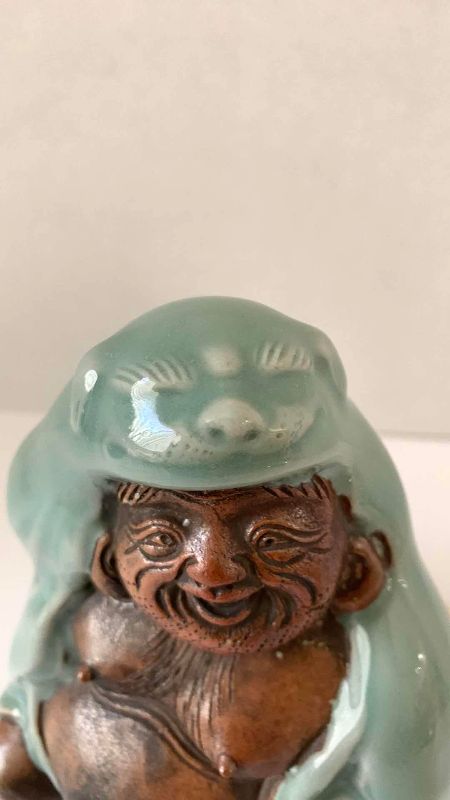Photo 1 of ANTIQUE SEIGI (CELADON) FIGURE OF HOTEI HOLDING UCHIWA (FAN) MEIJI PERIOD (1868-1912) 8 1/2”