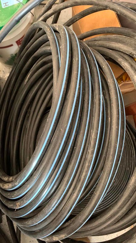 Photo 1 of ROLL OF PLASTIC TUBING 3/4”