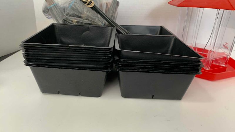 Photo 1 of BIRD FEEDER AND GARDENING SUPPLIES