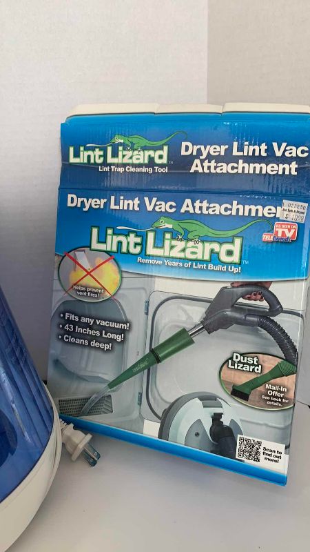 Photo 1 of VICKS HUMIDIFIER AND A LINT LIZARD