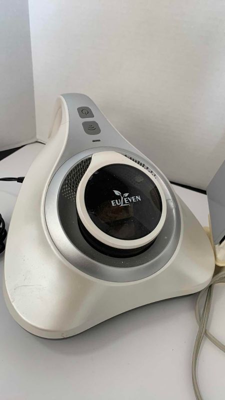 Photo 1 of NORELCO  IRON AND EULEVEN MINI VACUUM