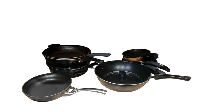 Photo 1 of CONTENTS OF CABINET PANS, SKILLETS, LARGE SERVING PLATES, AND A CALPHALON PAN