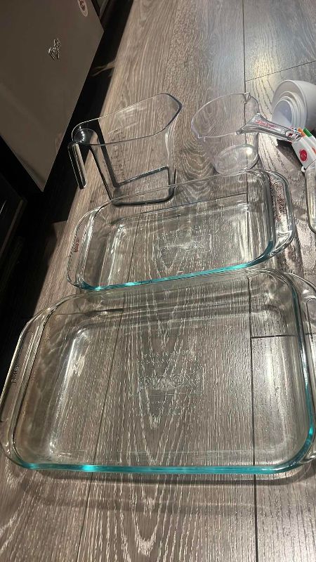 Photo 1 of BAKEWARE SET, PYREX BAKING PANS, MEASURING CUPS, AND A FUNNEL