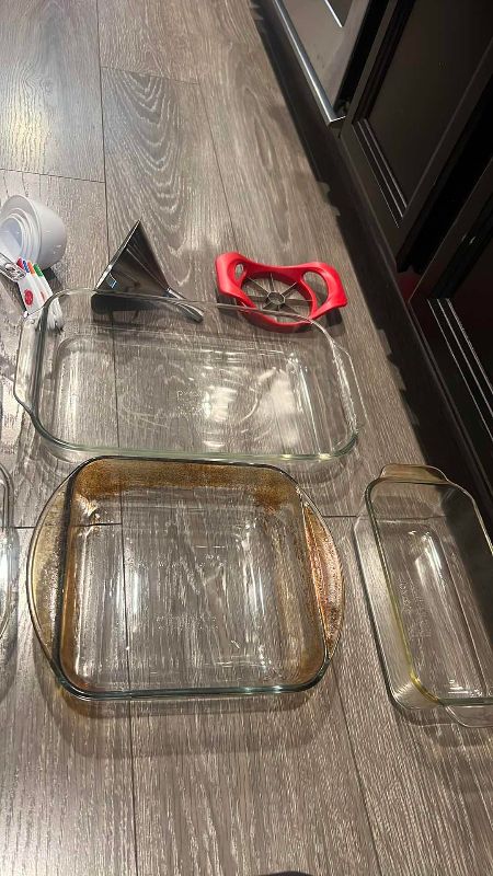 Photo 1 of BAKEWARE SET, PYREX BAKING PANS, MEASURING CUPS, AND A FUNNEL