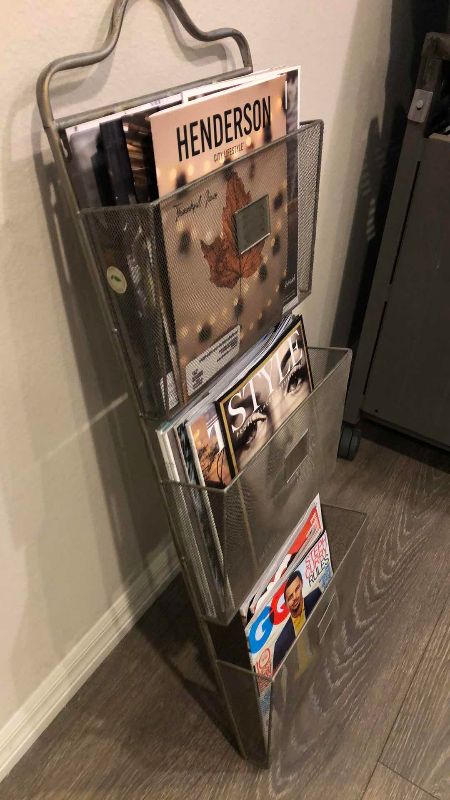 Photo 1 of METAL MAGAZINE RACK 38” X 15”