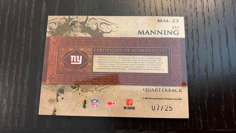 Photo 1 of 2007 DONRUSS NFL FOOTBALL ELI MANNING SIGNED JERSEY CARD 7/25