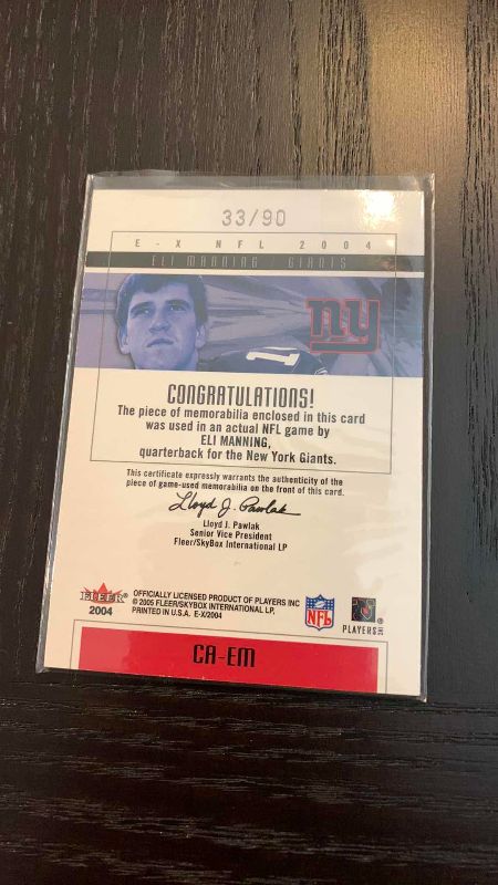 Photo 1 of 2005 FLEER ELI MANNING JERSEY CARD 33/90 NFL FOOTBALL