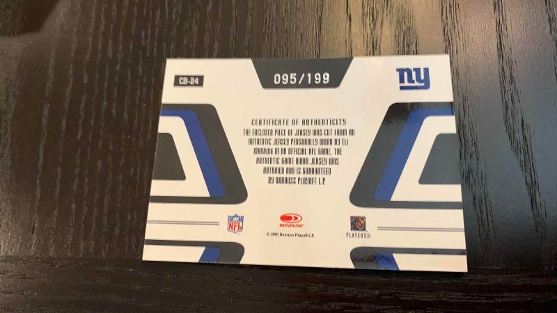 Photo 1 of 2005 DONRUSS ELI MANNING JERSEY CARD 95/199 NFL FOOTBALL