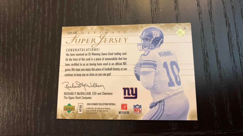 Photo 1 of 2006 UPPER DECK ELI MANNING QUAD JERSEY CARD NFL FOOTBALL 5/50