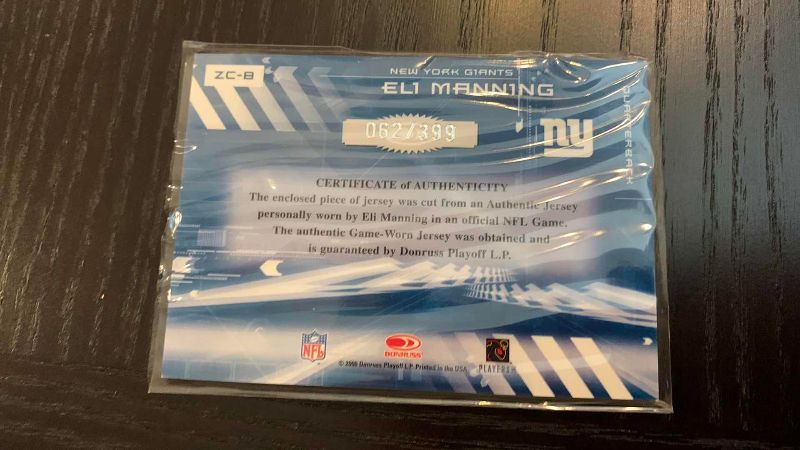 Photo 1 of 2006 DONRUSS ELI MANNING JERSEY CARD 62/399 NFL FOOTBALL