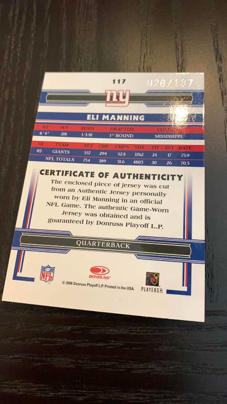 Photo 1 of 2006 DONRUSS ELI MANNING JERSEY CARD 26/137 NFL FOOTBALL