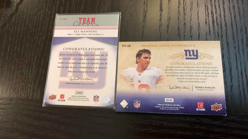 Photo 1 of 2-ELI MANNING JERSEY CARDS
