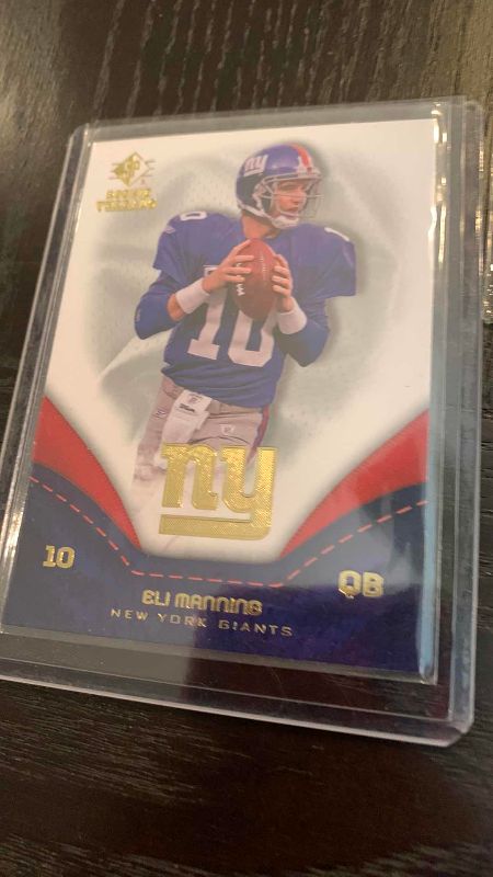 Photo 1 of 10-ELI MANNING CARDS NFL FOOTBALL