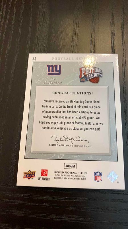 Photo 1 of 2008 UPPER DECK ELI MANNING JERSEY CARD 21/25 NFL FOOTBALL