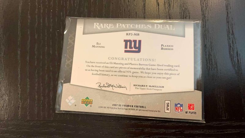 Photo 1 of 2007 UPPER DECK ELI MANNING AND PLAXICO BURRESS JERSEY CARD 8/50 NFL FOOTBALL