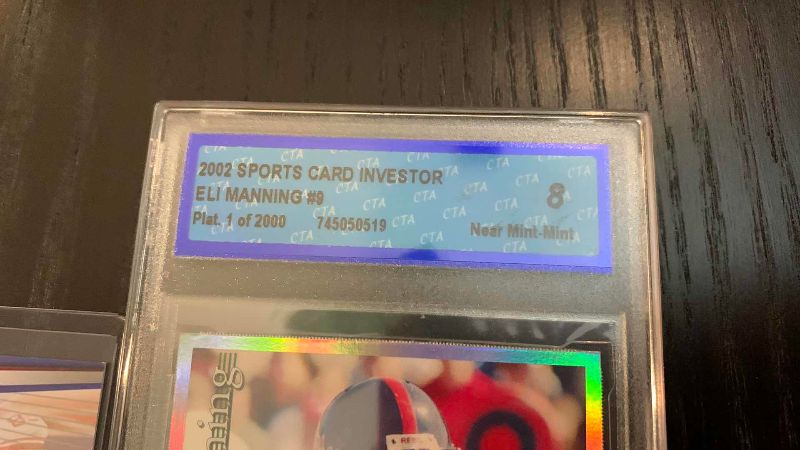 Photo 1 of 2-ELI MANNING CARDS ONE GRADED