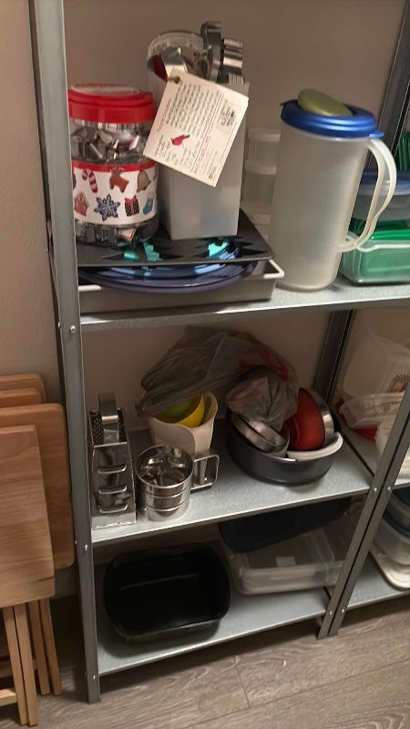Photo 1 of SHELVES OF PLASTIC TUPPERWARE SHELVING INCLUDED 48” X 11” X 56” H