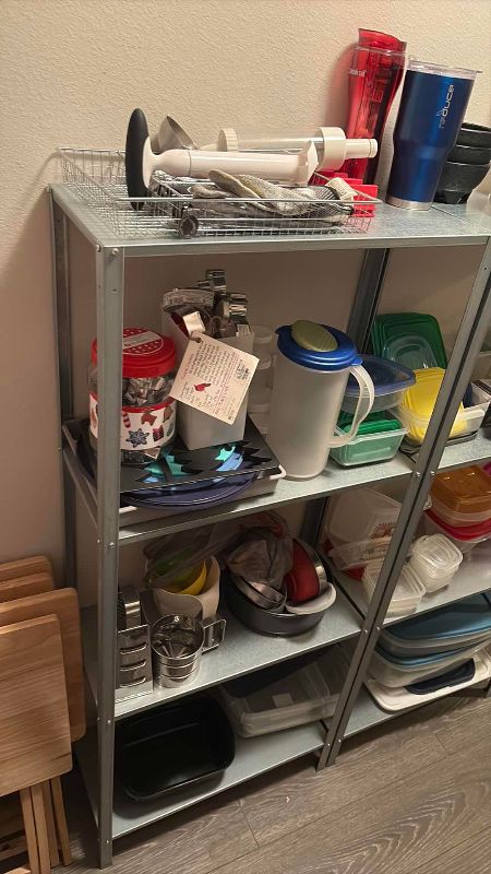 Photo 1 of SHELVES OF PLASTIC TUPPERWARE SHELVING INCLUDED 48” X 11” X 56” H