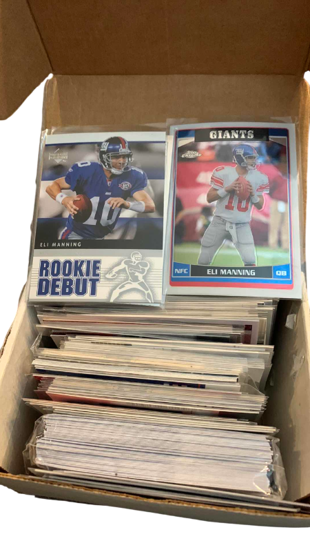 Photo 1 of LOT OF ELI MANNING CARDS