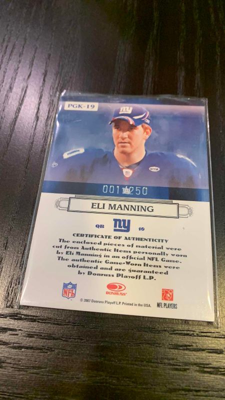 Photo 1 of 2007 DONRUSS ELI MANNING DOUBLE JERSEY CARD 1/250 NFL FOOTBALL
