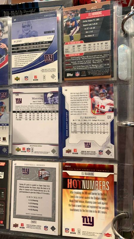Photo 1 of 9-ELI MANNING FOOTBALL CARDS