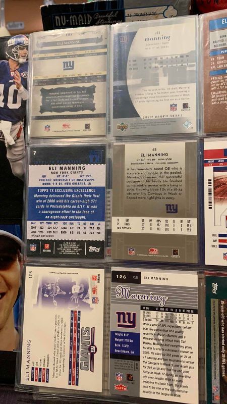 Photo 1 of 9-ELI MANNING FOOTBALL CARDS