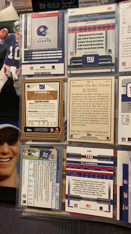 Photo 1 of 9-ELI MANNING FOOTBALL CARDS ONE NUMBERED