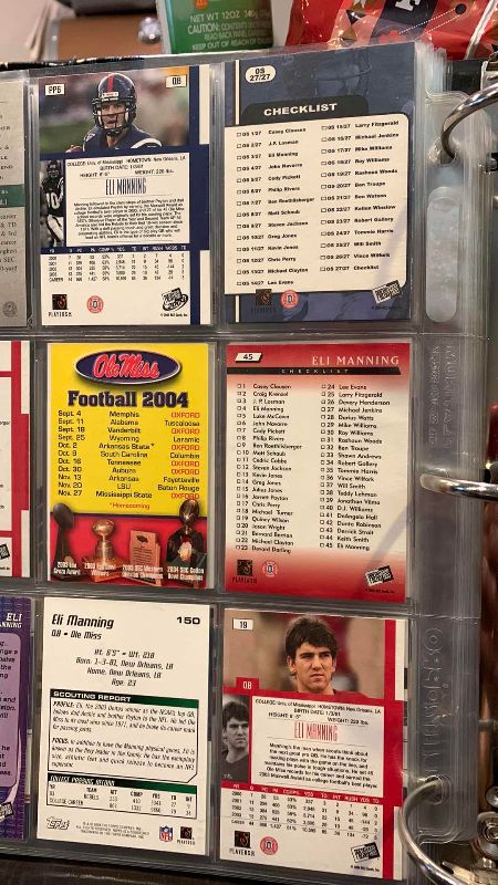 Photo 1 of 9-ELI MANNING FOOTBALL CARDS