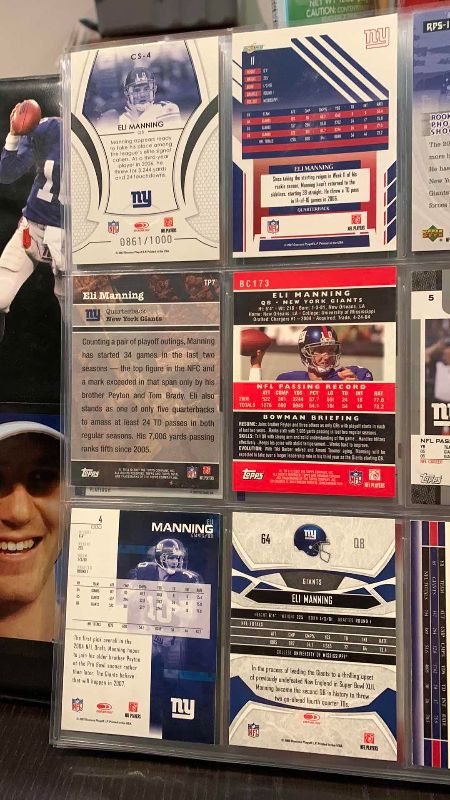 Photo 1 of 9-ELI MANNING FOOTBALL CARDS SOME NUMBERED