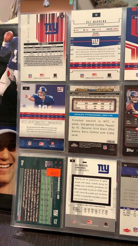 Photo 1 of 9-ELI MANNING FOOTBALL CARDS