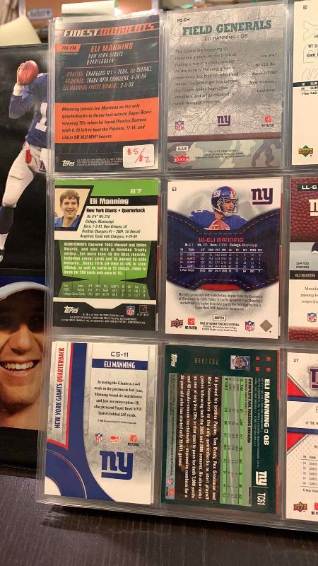 Photo 1 of 9-ELI MANNING FOOTBALL CARDS