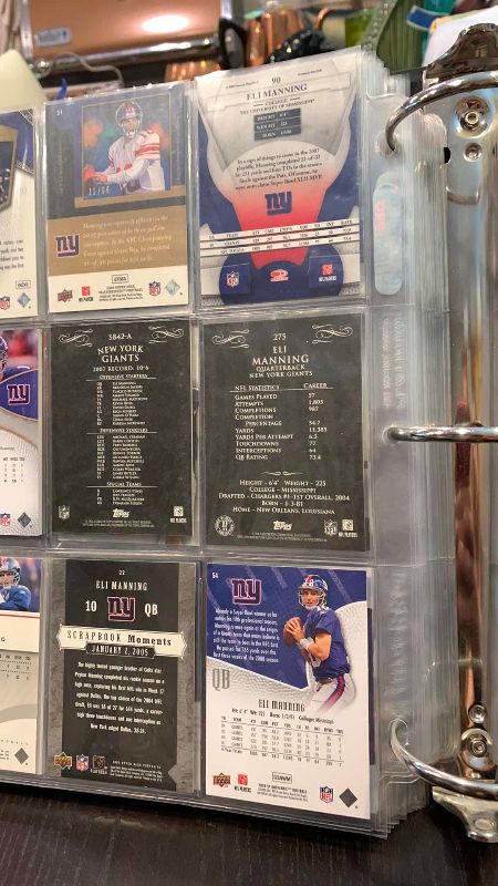 Photo 1 of 9-ELI MANNING FOOTBALL CARDS