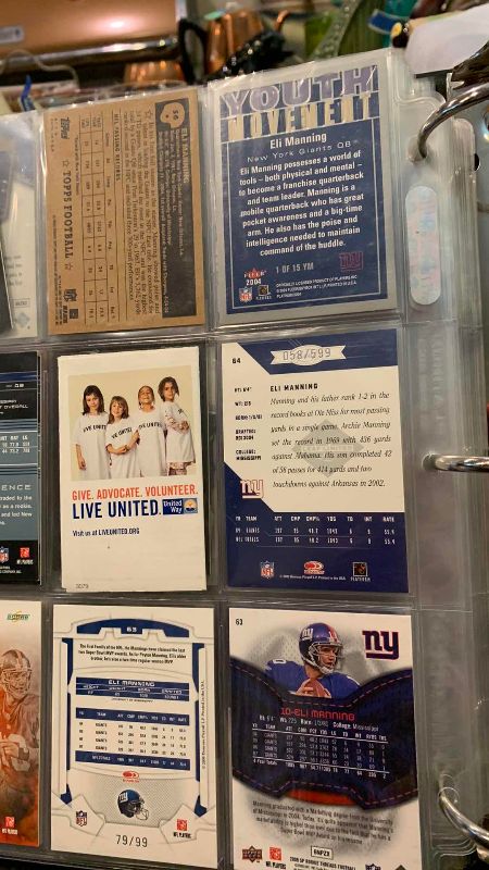 Photo 1 of 9-ELI MANNING FOOTBALL CARDS ONE NUMBERED
 