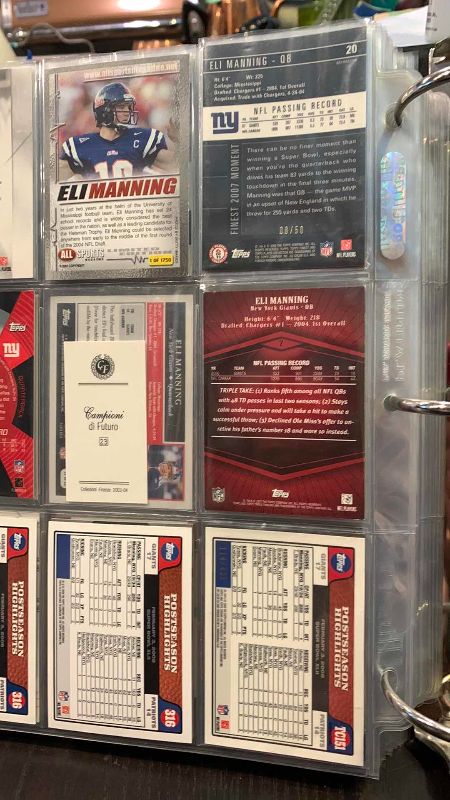 Photo 1 of 9-ELI MANNING FOOTBALL CARDS ONE NUMBERED