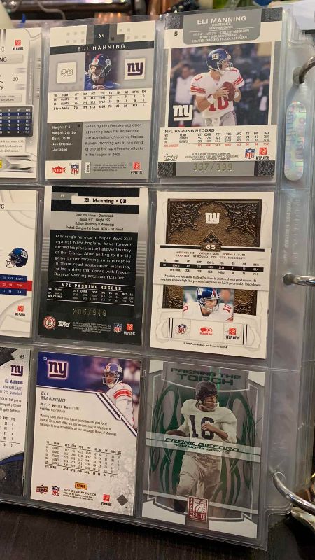 Photo 1 of 9-ELI MANNING FOOTBALL CARDS SOME NUMBERED